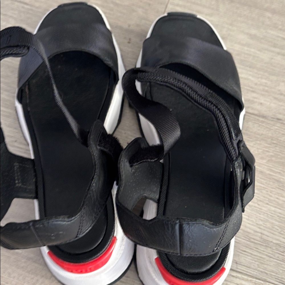 Sorrel Women's Black Sport Slide Sandals with White Soles